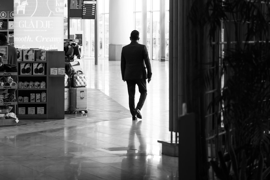 A business traveler walking through a terminal